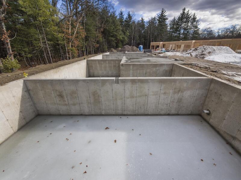 a newly constructed concrete foundation